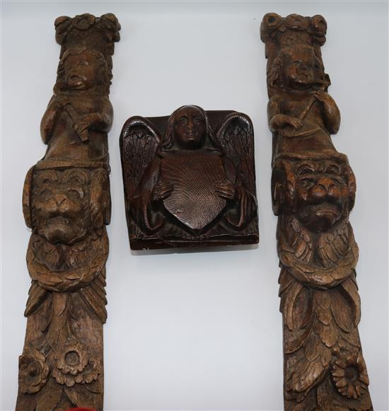 A pair of 19th century oak carvings, 7.25in.